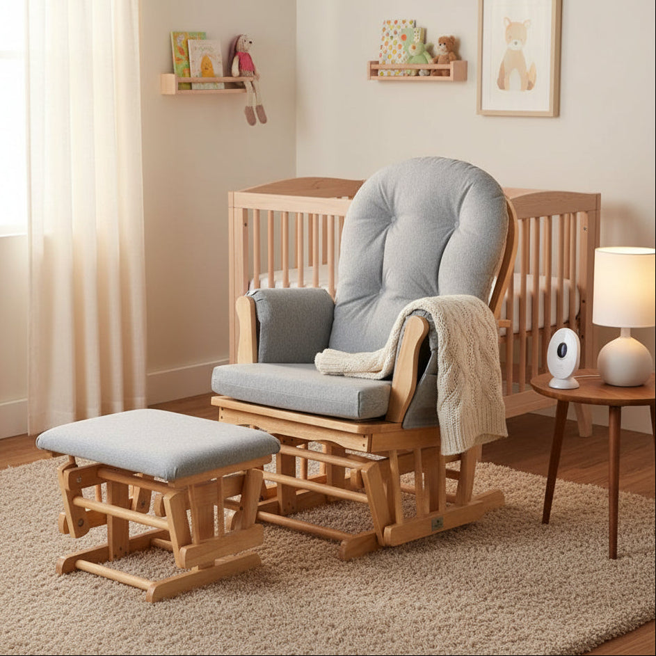 Wooden rocking chair with gray cushions and matching ottoman in baby bedroom