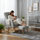 Woman sitting in a rocking chair holding a baby in a nursery with a crib and decor.