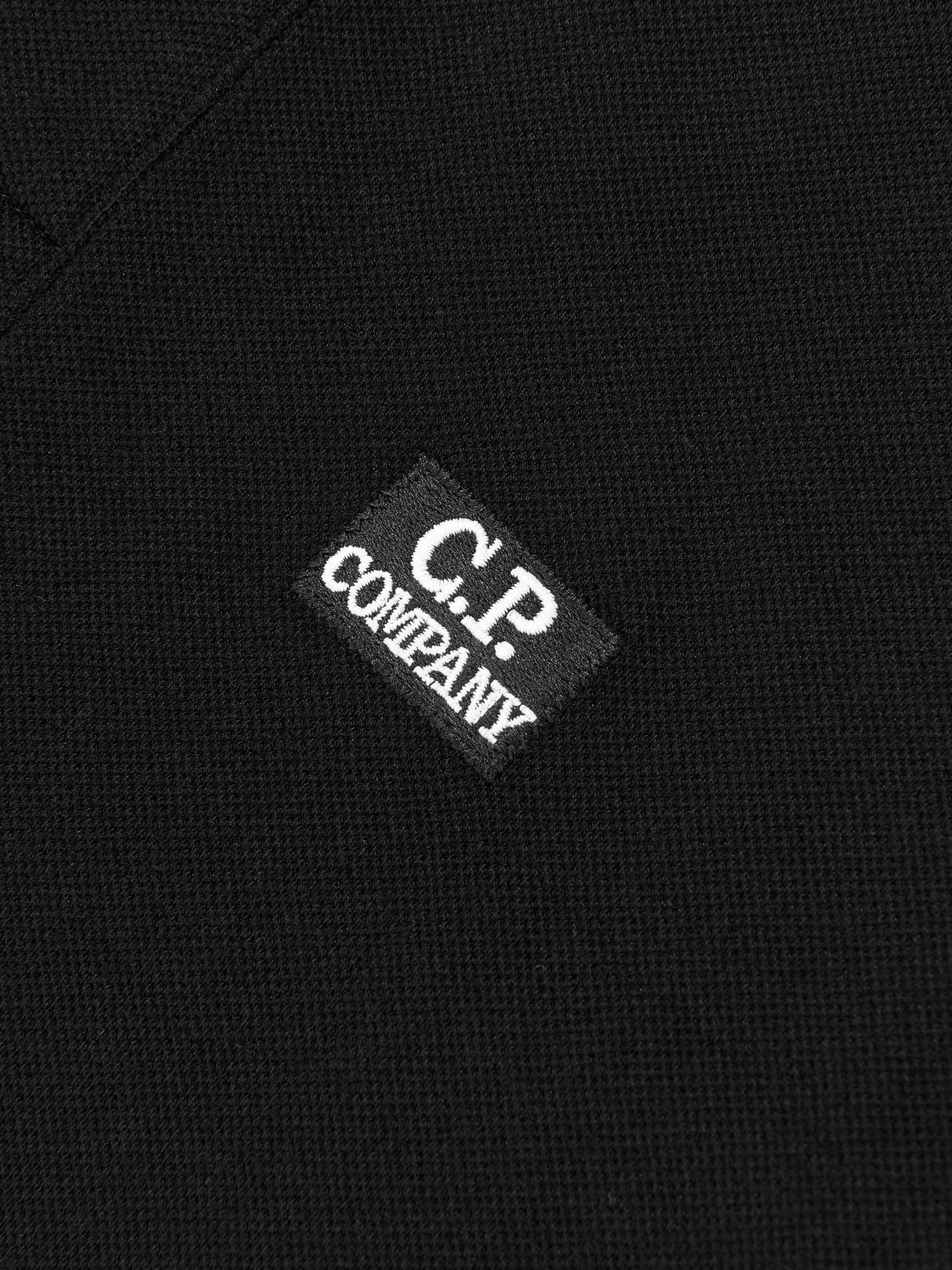 C.P. Company Boys Logo Polo Shirt in Black