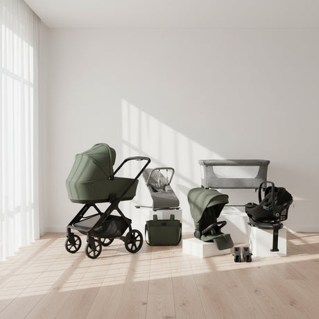 Collection of baby products including a stroller, car seat, and bassinet on a white background